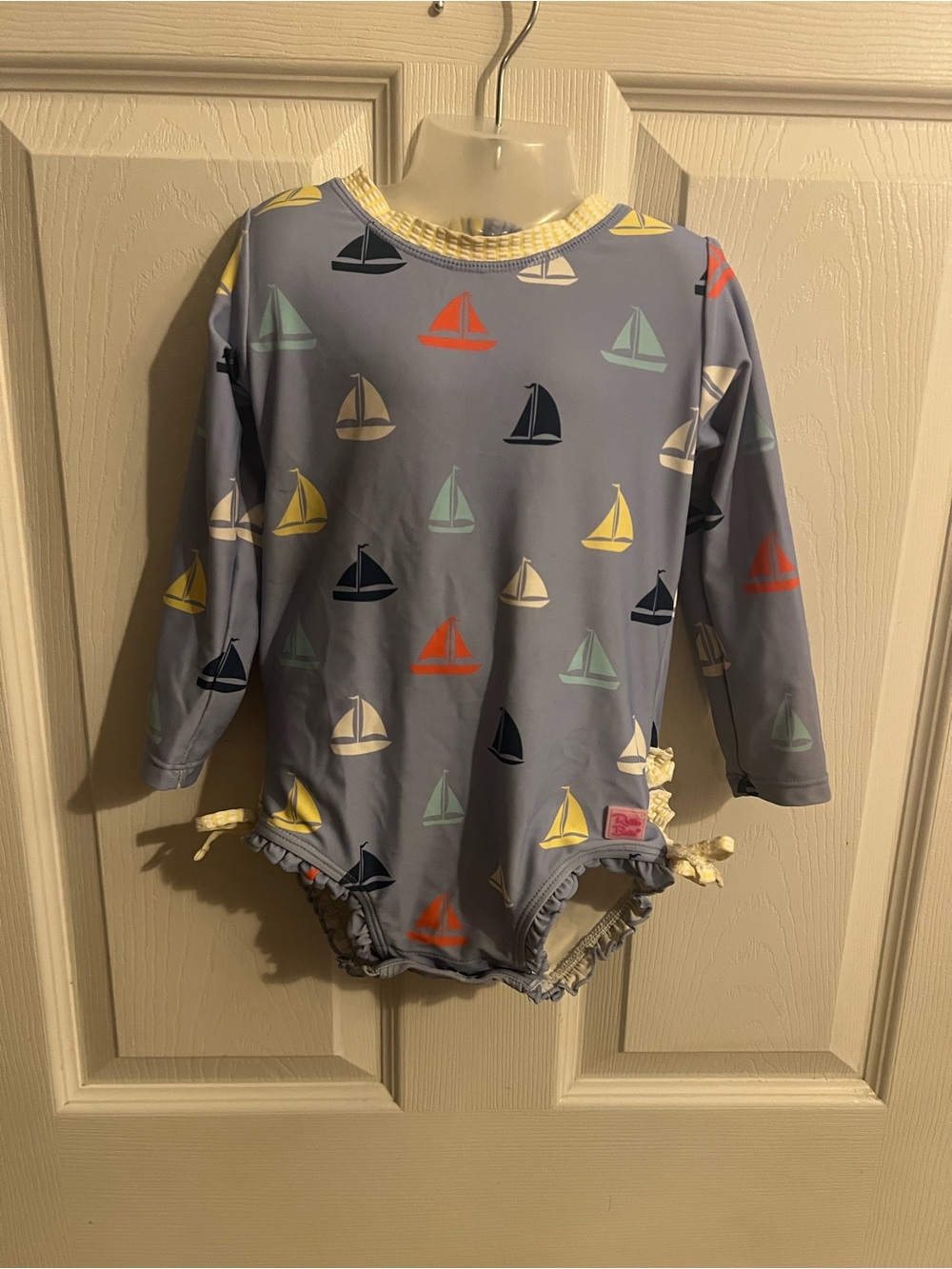 Ruffle Butts Light Blue Sailboat Swimsuit with Multi-Color 2T.